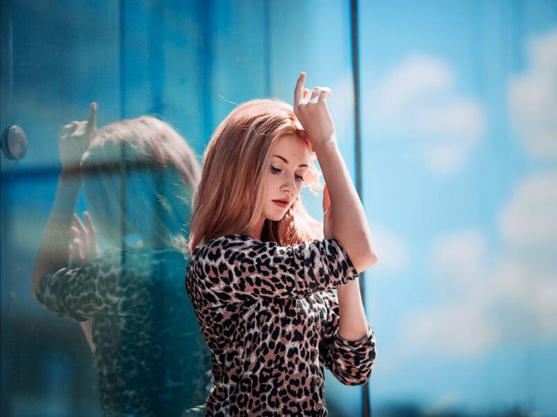 Woman in Leopard Shirt — Blue