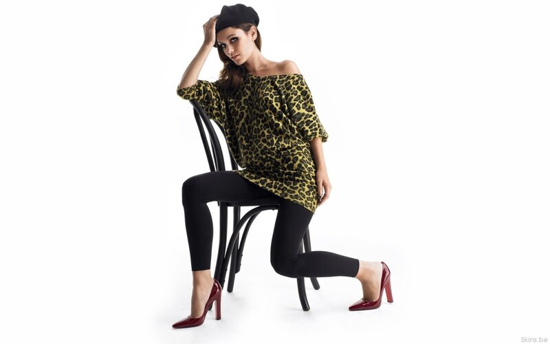 woman in leopard top and heels