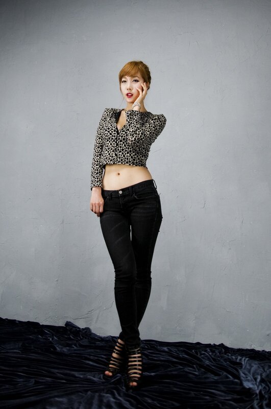 Woman in leopard top and jeans