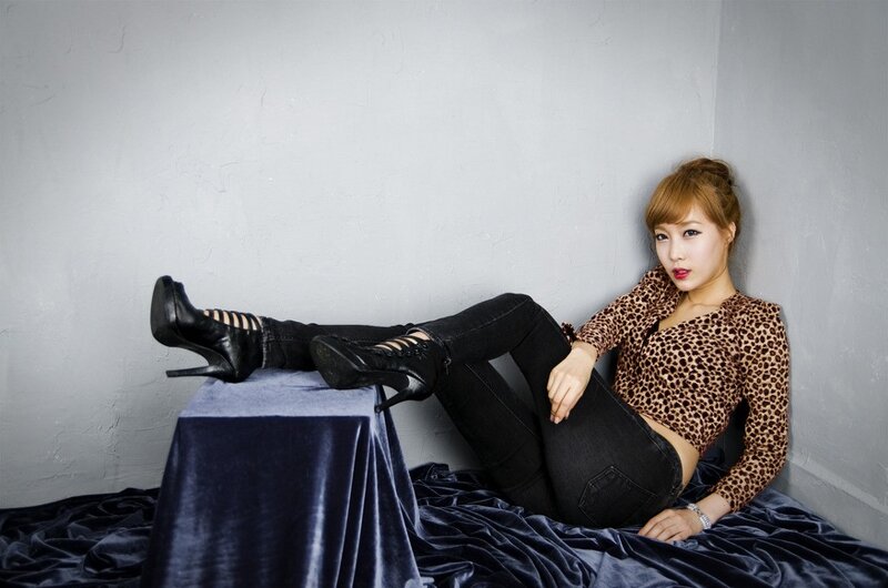 Woman in Leopard Top — Gray, Confident, Photograph