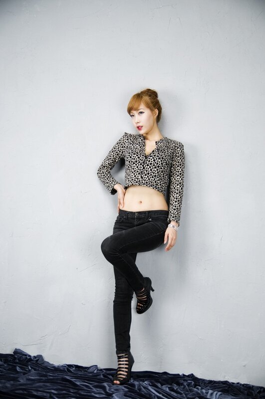 Woman in Leopard Top — Gray, Confident