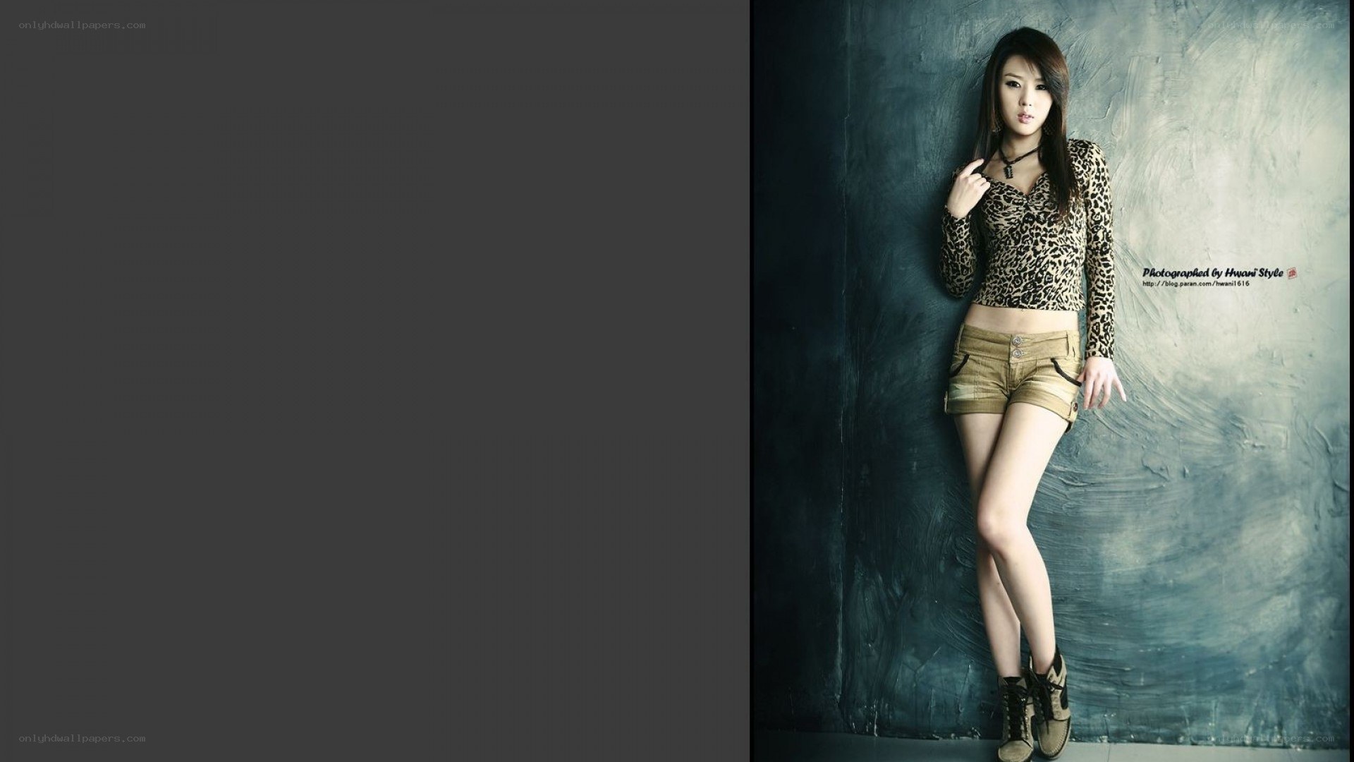 woman in leopard top posing