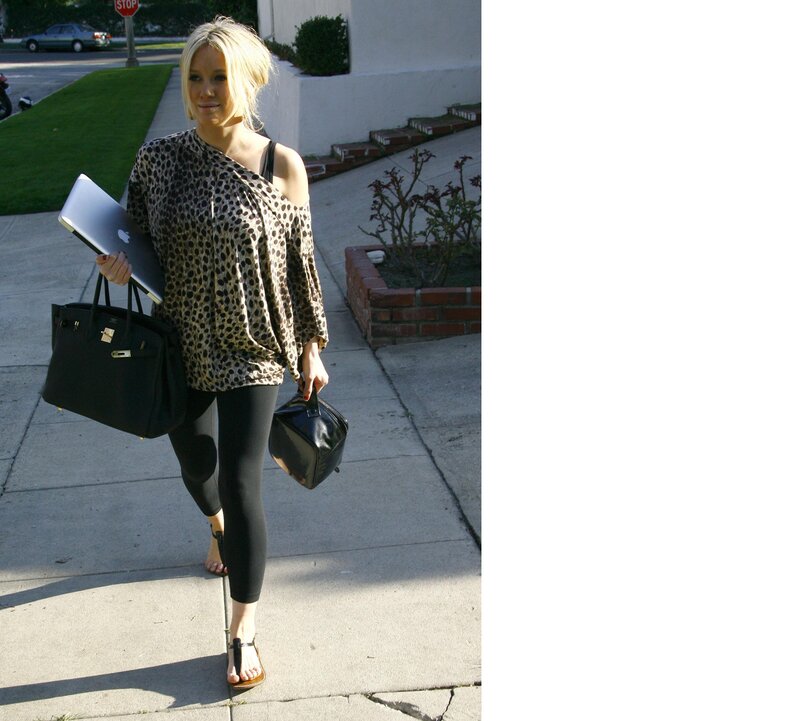 Woman in leopard top walking