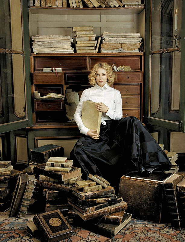 woman in library with books