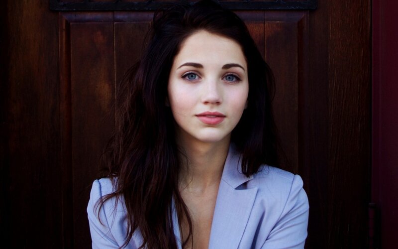 woman in light blue blazer