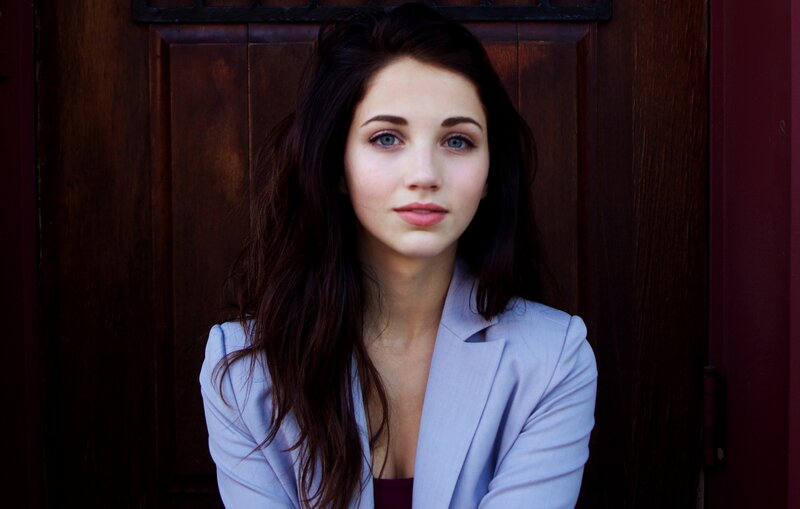 woman in light blue blazer