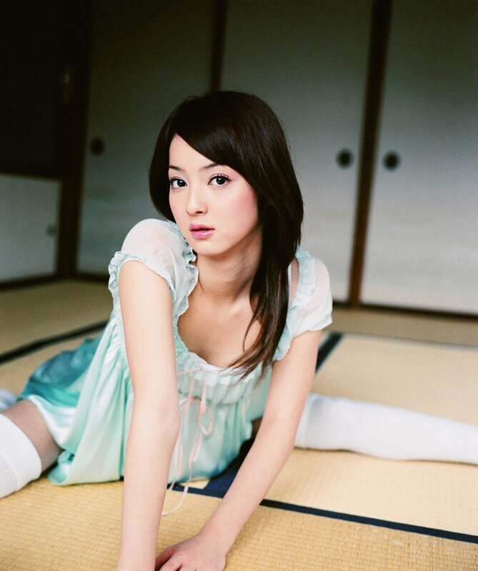 woman in light blue dress on tatami