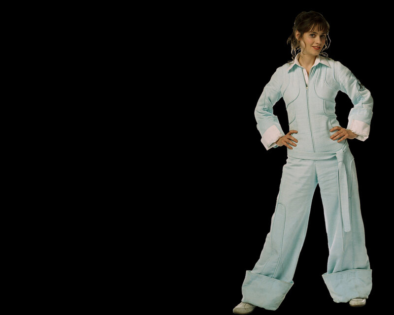 woman in light blue jumpsuit