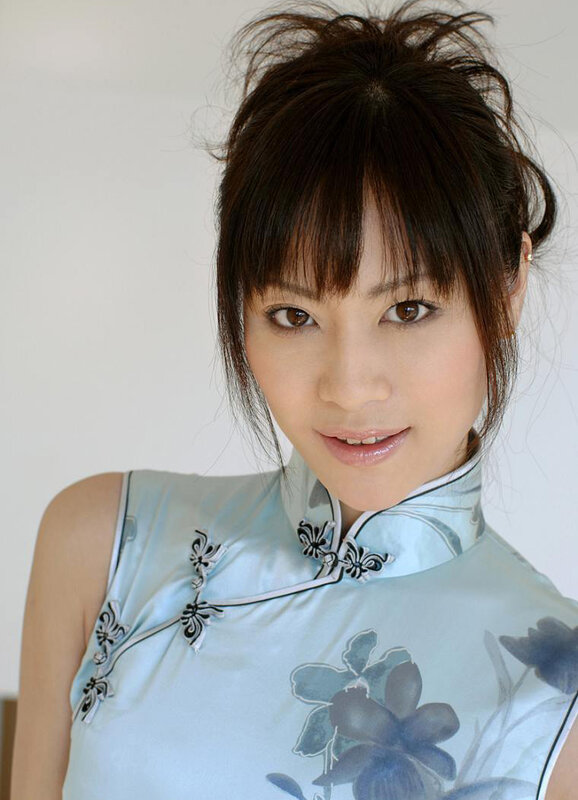 woman in light blue qipao