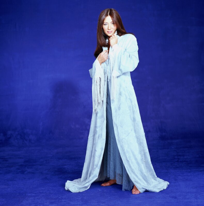 woman in light blue robe