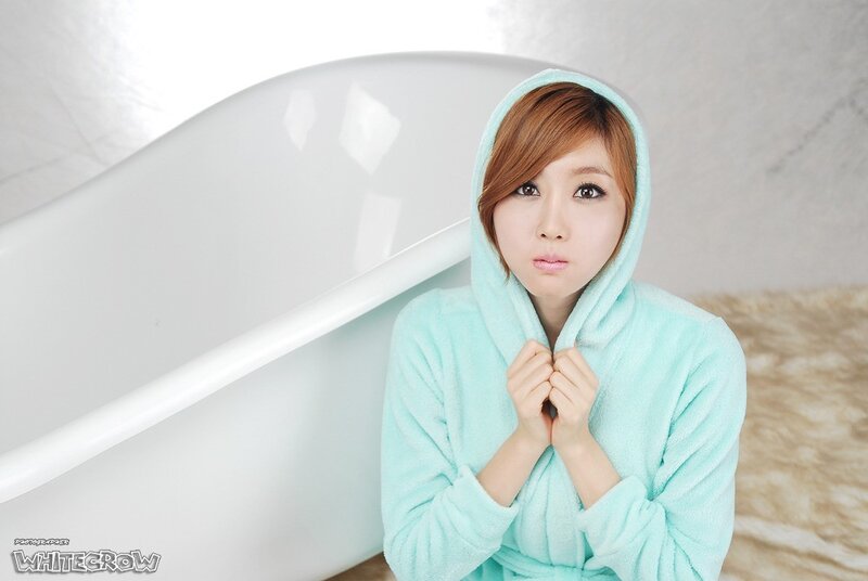 woman in light blue robe