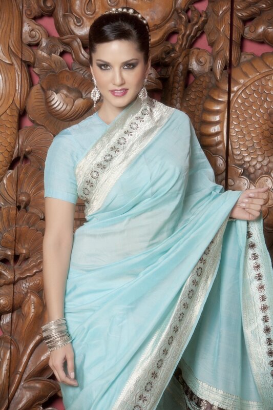 Woman in light blue sari