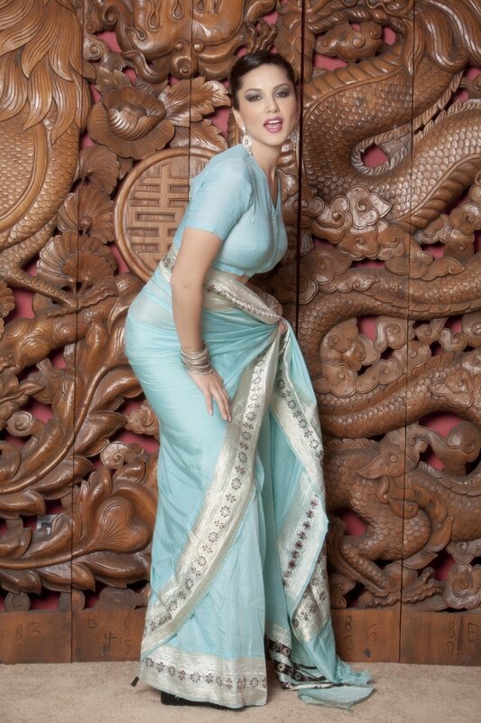 Woman in light blue sari
