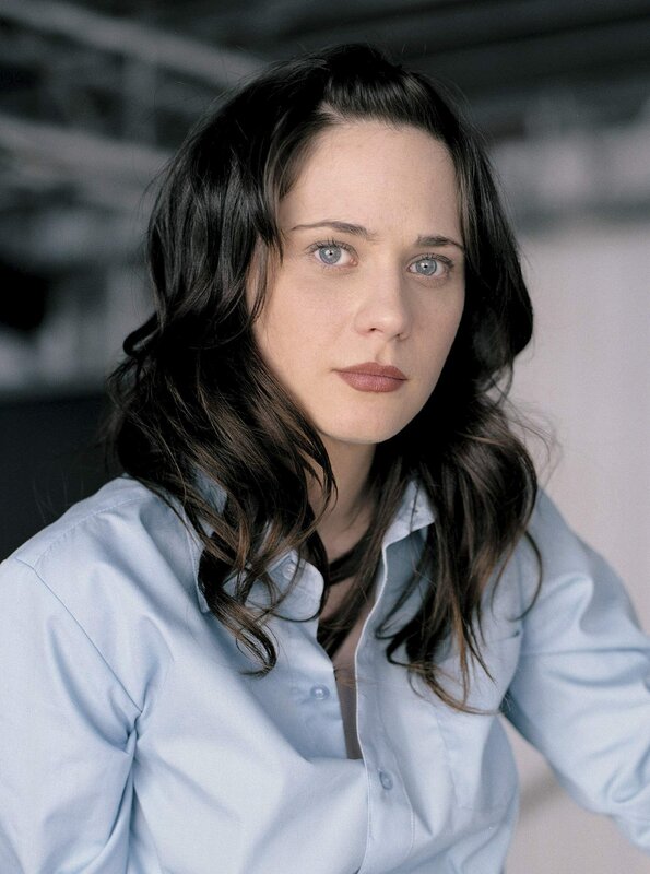 woman in light blue shirt