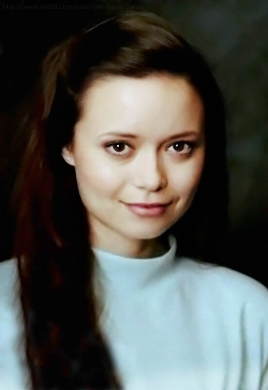 woman in light blue shirt