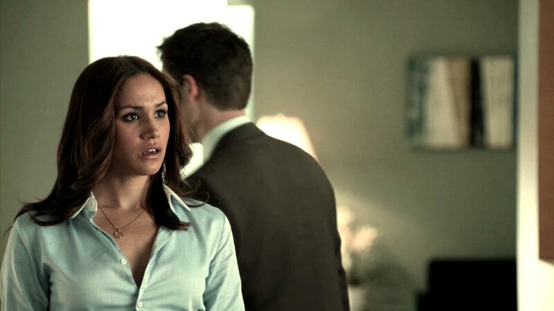 woman in light blue shirt