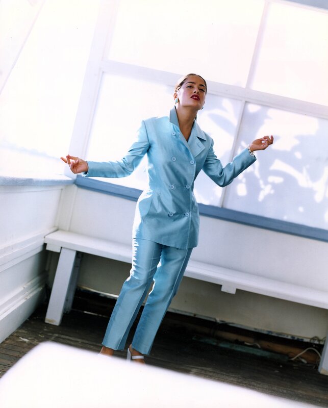 woman in light blue suit