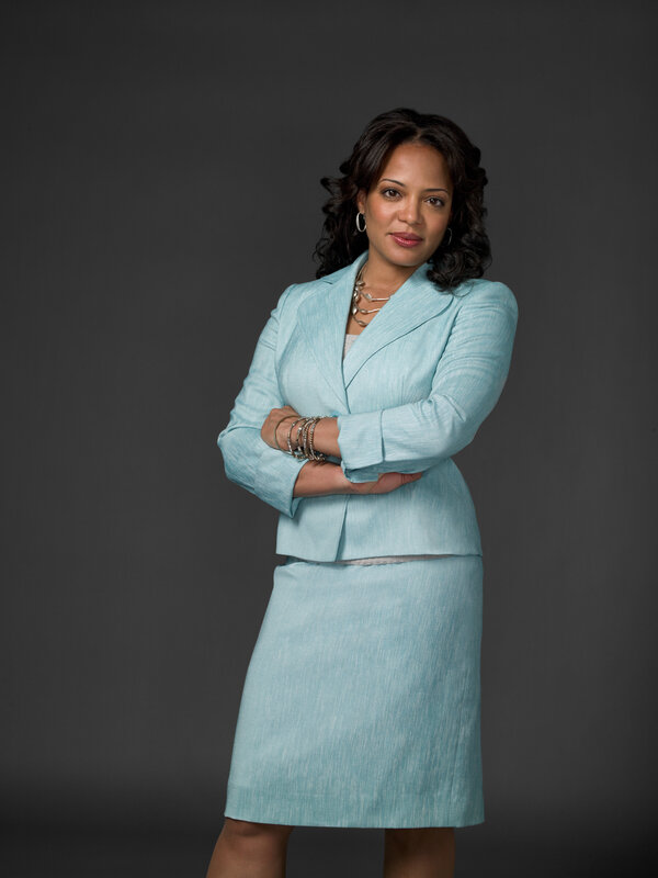 woman in light blue suit