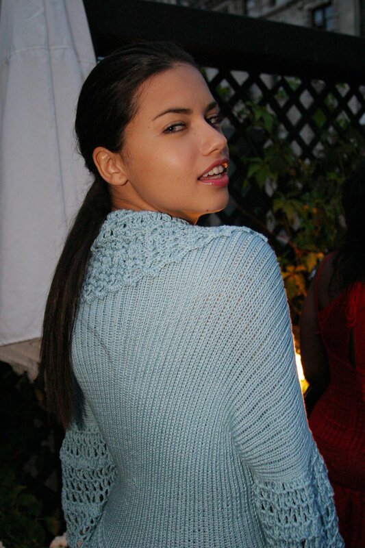 Woman in light blue sweater