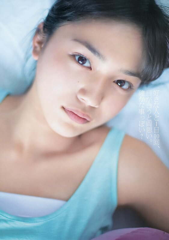 woman in light blue top