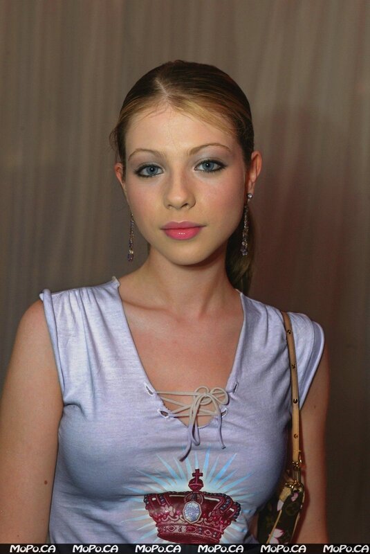 woman in light blue top