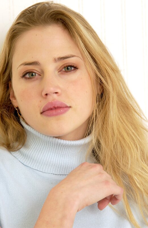 woman in light blue turtleneck