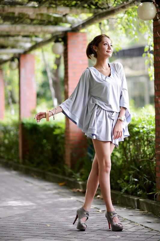 woman in light gray dress