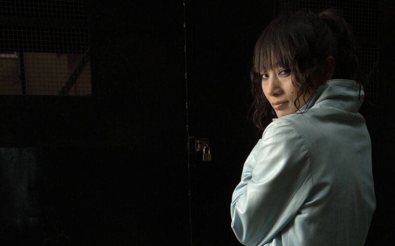 Woman in Light Jacket — Black