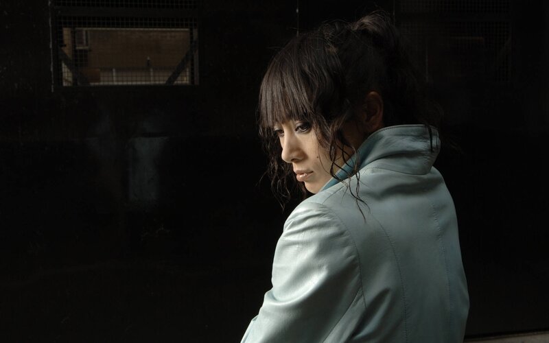 woman in light jacket