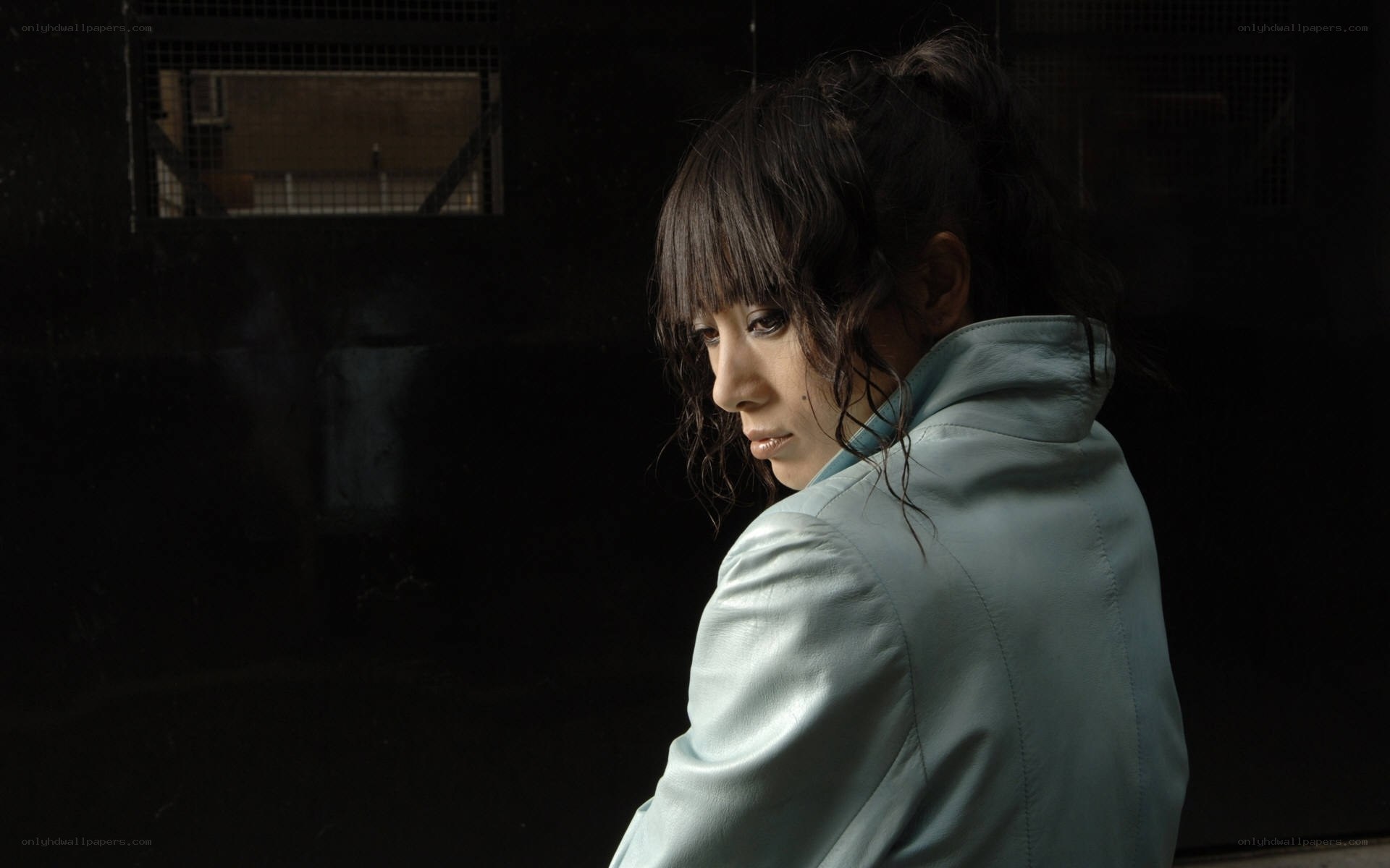 woman in light jacket