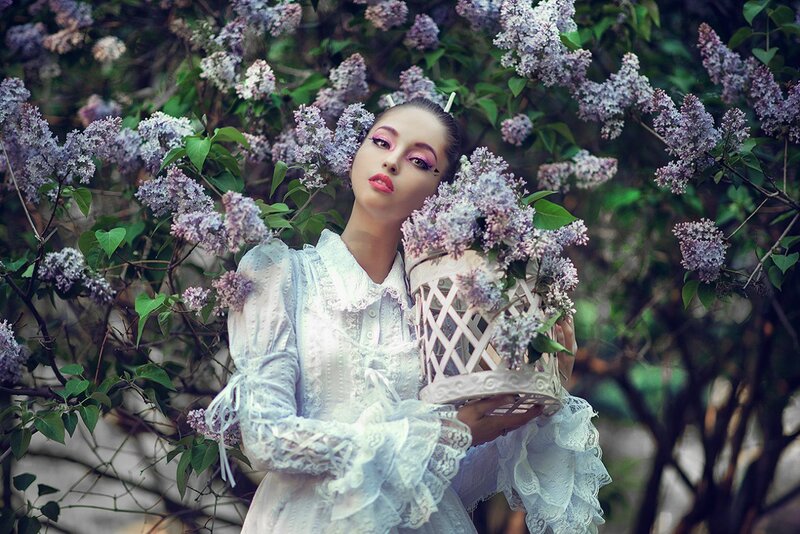Woman in Lilac Bush