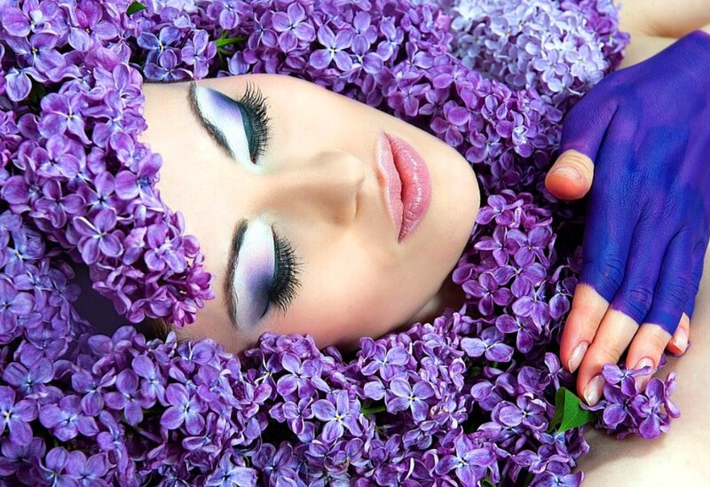 Woman in Lilac Flowers