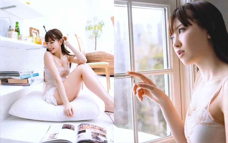 woman in lingerie by window