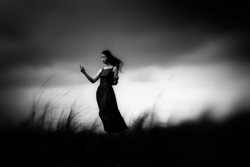 Woman in Long Dress — Black, Dramatic, Night, Photograph, Grass