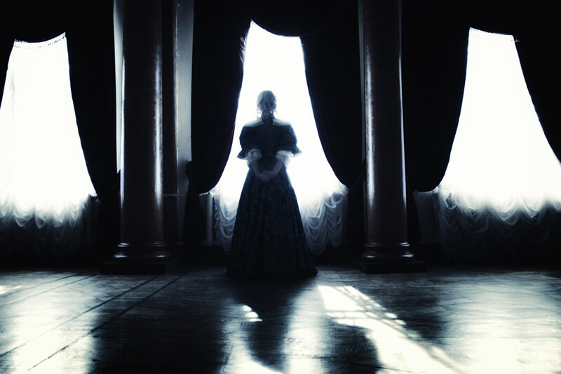 Woman in Long Dress — Black, Dramatic, Photograph, Pillars