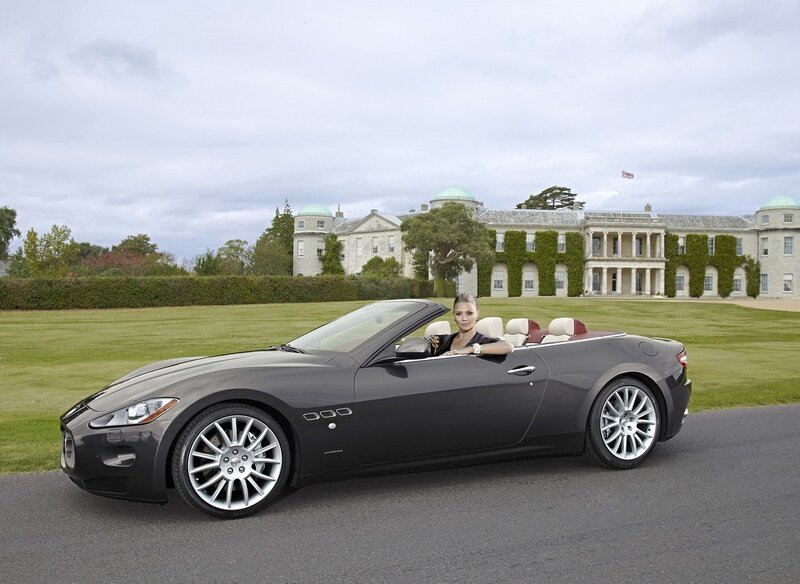 Woman in luxury convertible