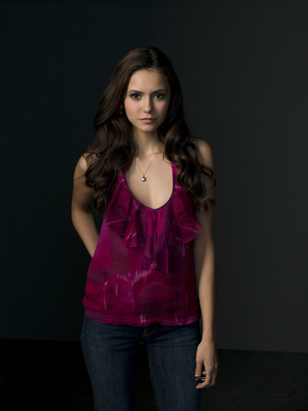 woman in magenta top