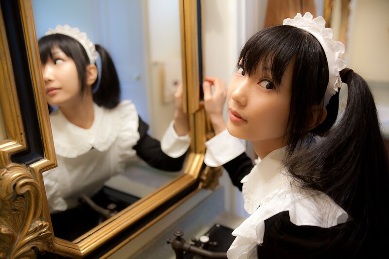 Woman in Maid Costume — Black, Playful, Photograph, Mirror, Hair Bow