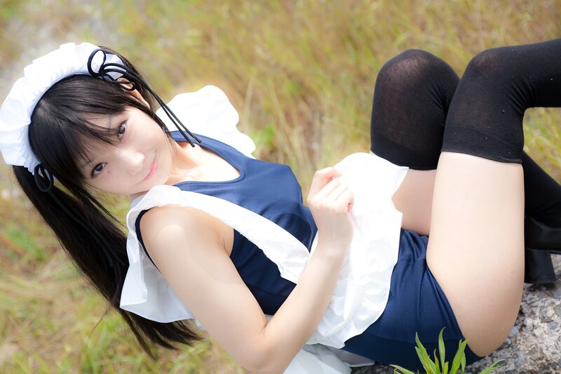 Woman in Maid Costume — Blue, Playful, Afternoon