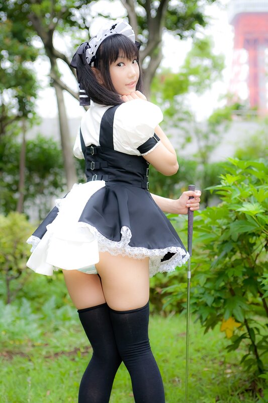 woman in maid costume outdoors