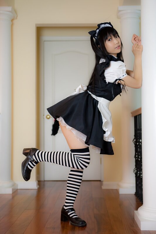 woman in maid costume posing