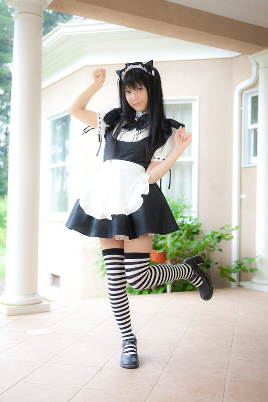 woman in maid costume posing