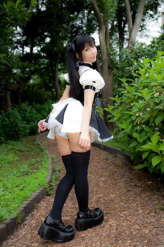 Woman in Maid Outfit — Black, Serene, Afternoon