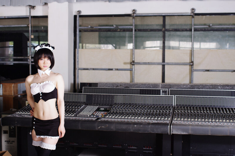 woman in maid outfit in studio