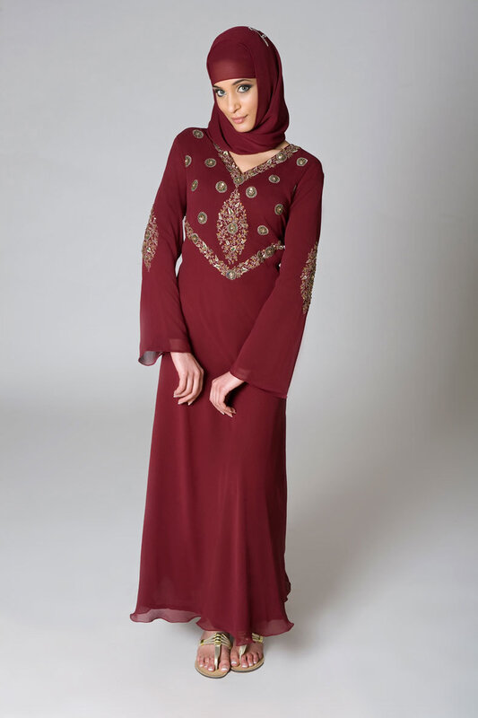 woman in maroon abaya