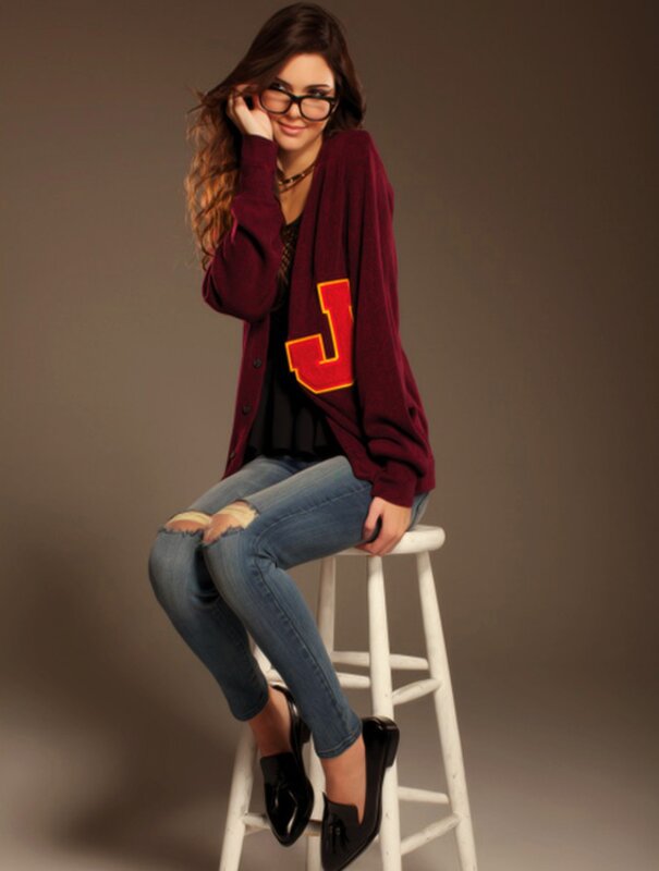 woman in maroon cardigan