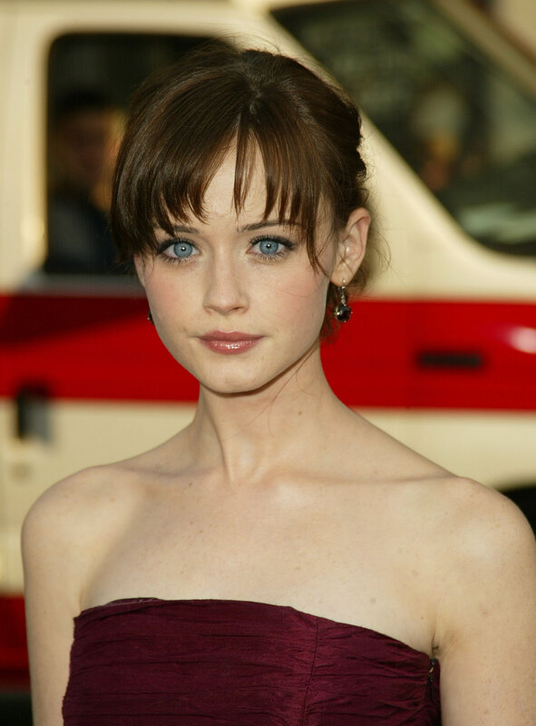 woman in maroon dress