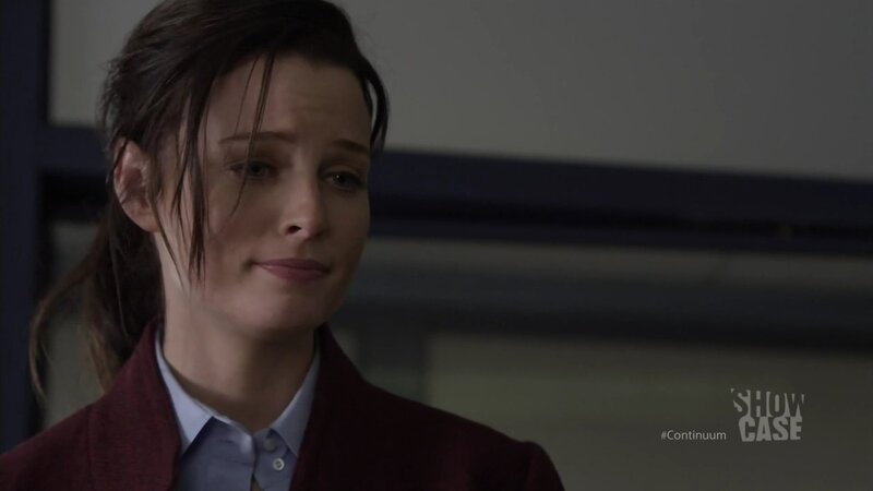 woman in maroon jacket