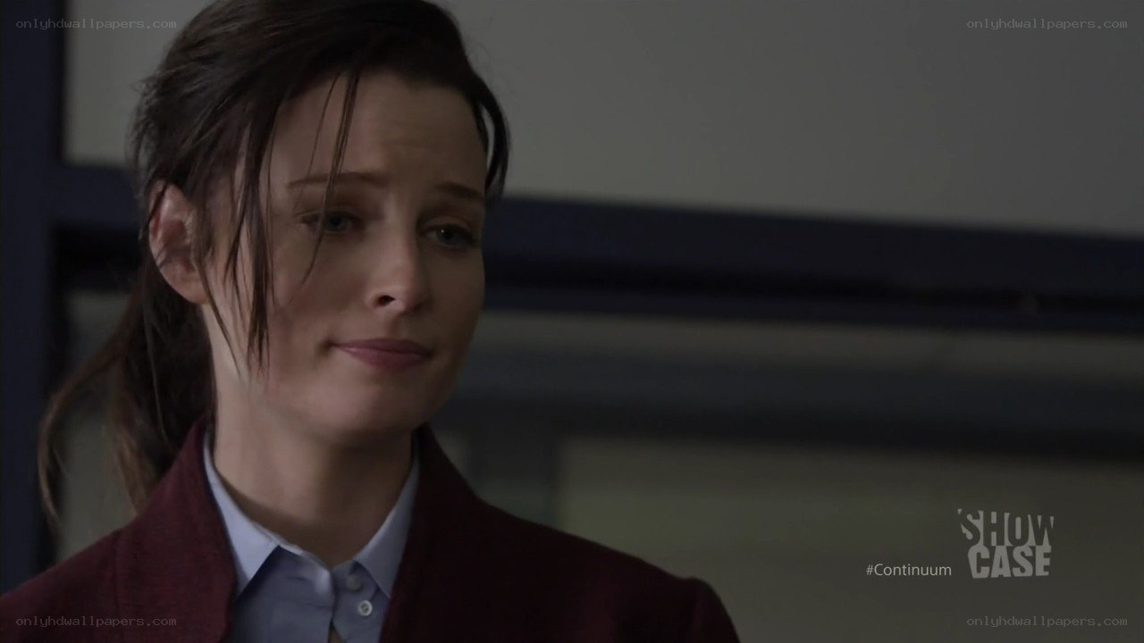 woman in maroon jacket