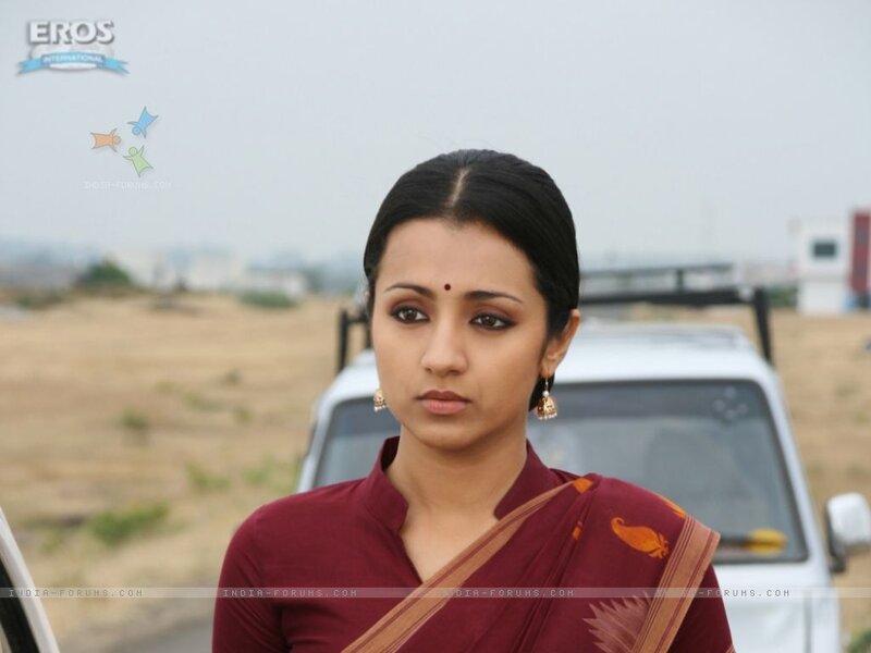 Woman in Maroon Sari — Serious